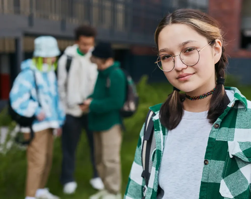 Teen girl with glasses participating in a Teen Outpatient Behavioral Health Program in California at Ascend Behavioral Health.