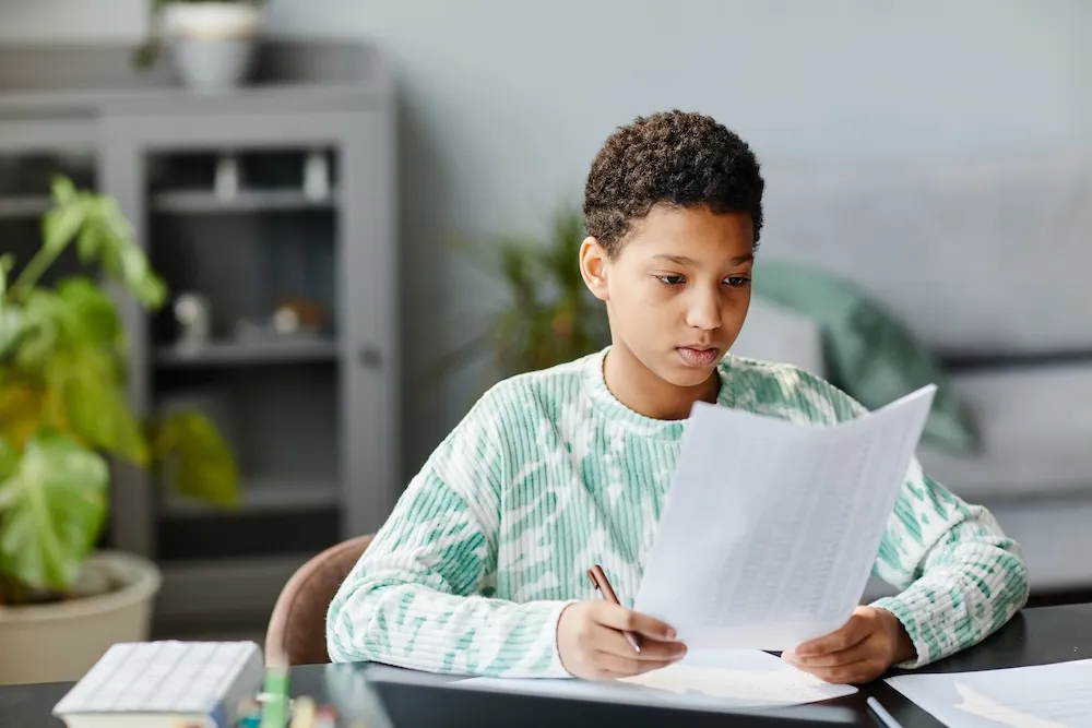 Child doing school in Ascend's mental health program in Bakersfield.
