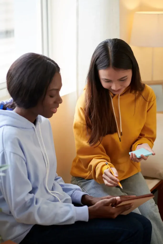 Ascend Behavioral Health | friends discussing video on tablet 2026 01 08 00 08 56 utc