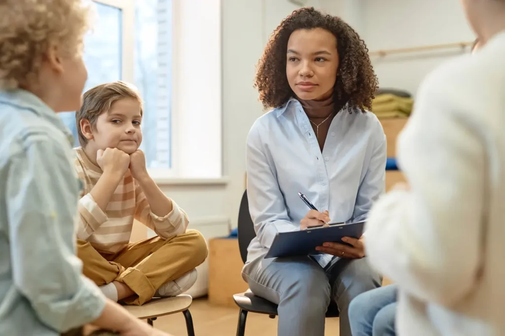 Ascend Behavioral Health | counselor with children in group therapy session 2026 03 19 09 30 27 utc Large