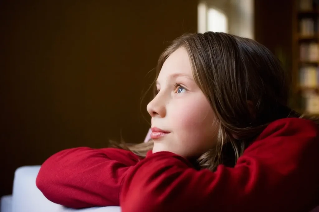 Ascend Behavioral Health | pensive girl looks out window in quiet home 2026 03 10 02 04 56 utc Large