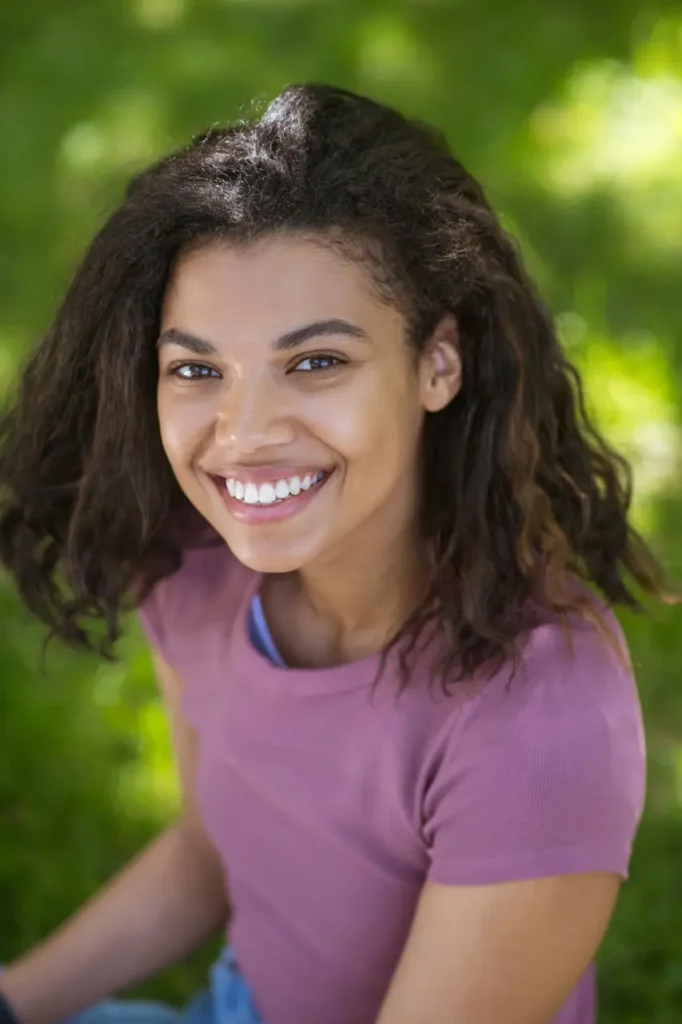 Ascend Behavioral Health | smiling young woman poses outdoors in green space 2026 01 11 11 11 26 utc Large