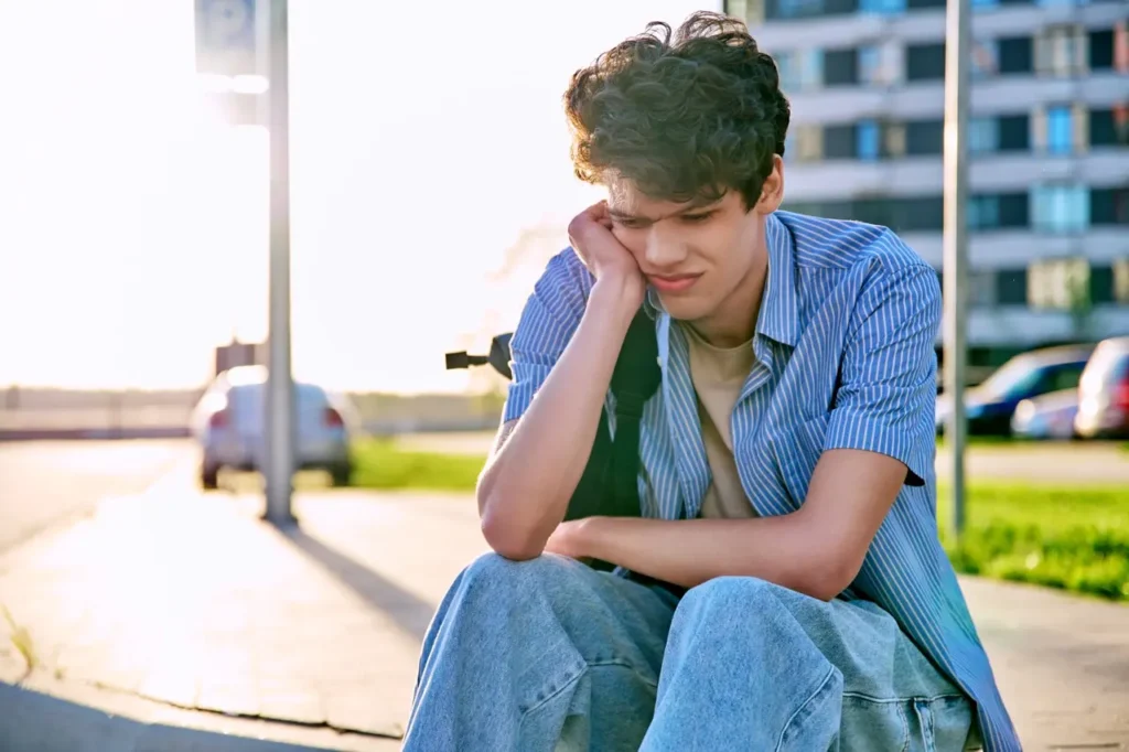 teen boy suffering from disruptive mood dysregulation disorder.